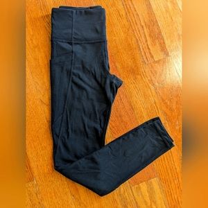 Athleta Salutation Stash Pocket Tight sz small